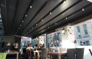 Group of people seating in the restaturant and eating